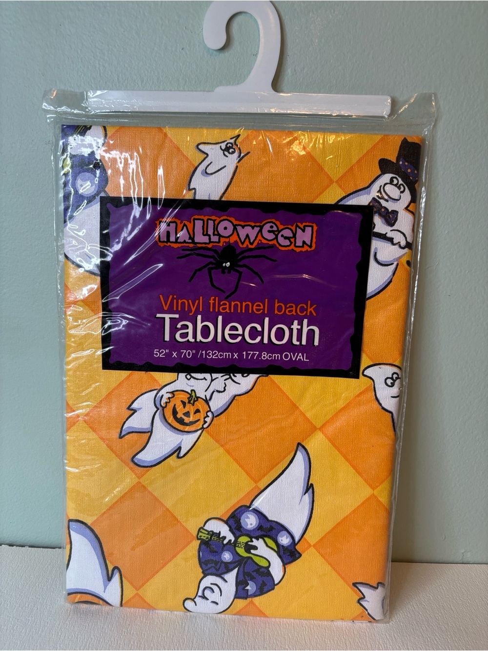 Vinyl Flannel Back Tablecloth - Orange Ghost Pattern